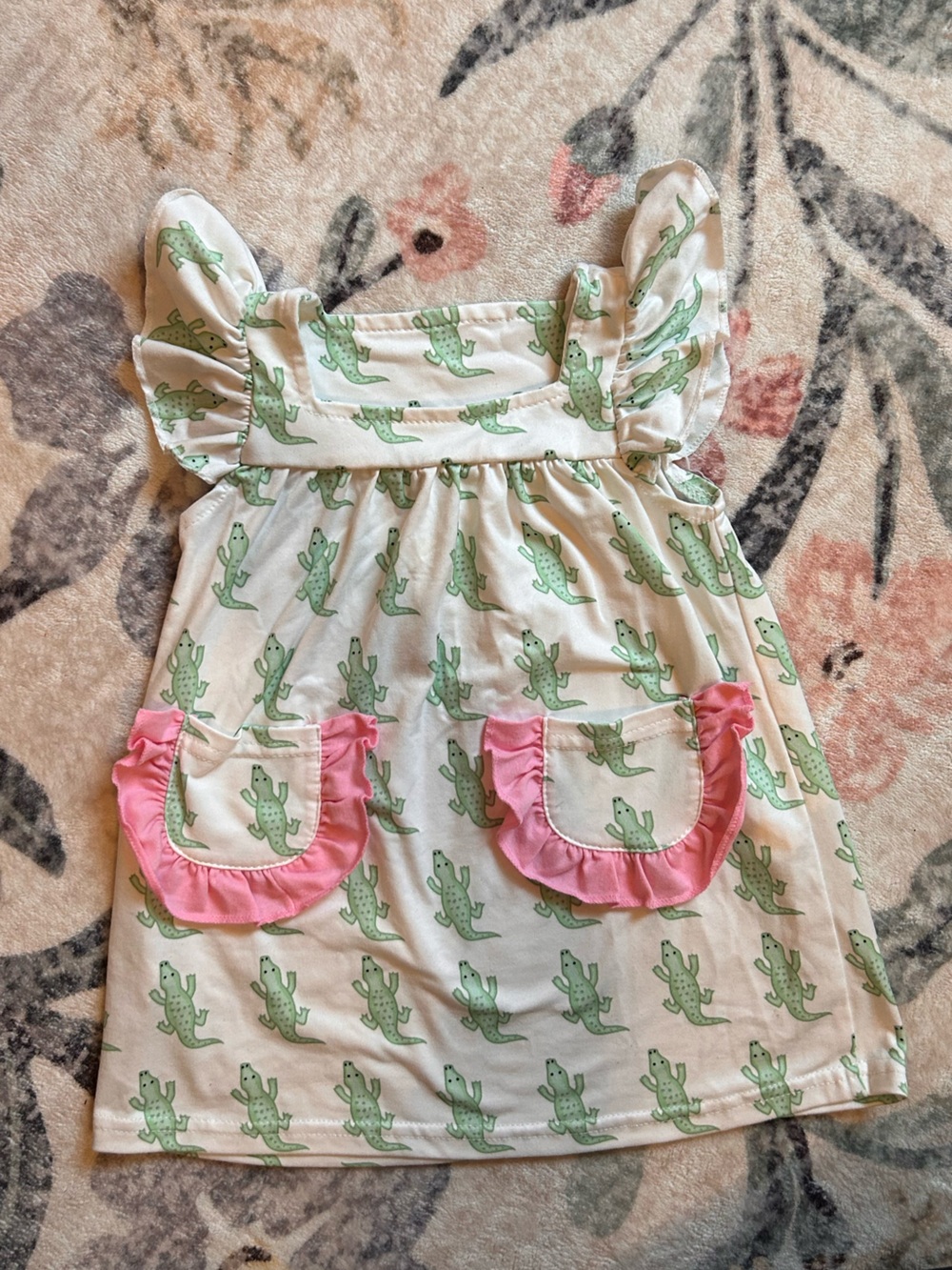 Girls Cream Dress with Green Alligator Print and Pink Ruffle Pockets